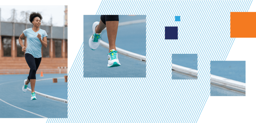 Woman running on track with close up of her sneakers